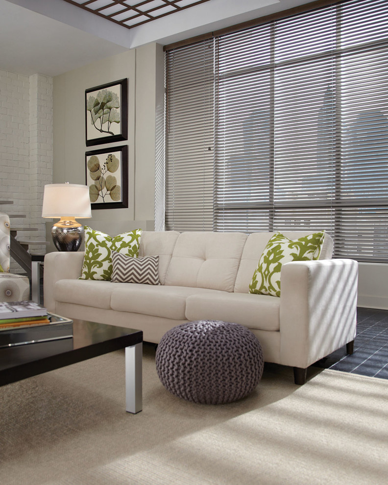 Foto de sala de estar abierta contemporánea grande sin chimenea y televisor con paredes beige y suelo de pizarra