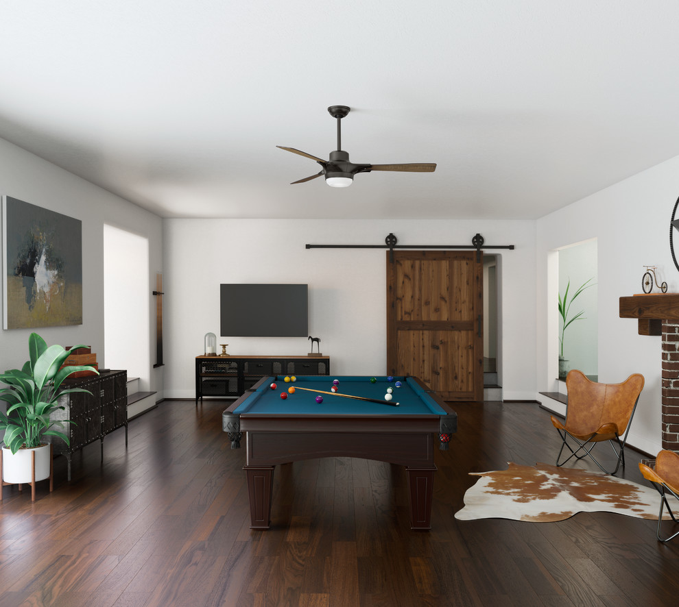 Ejemplo de sala de juegos en casa actual con paredes blancas, suelo de madera oscura, televisor colgado en la pared y suelo marrón