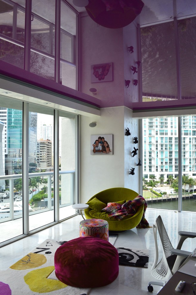 Inspiration for a large modern enclosed games room in Miami with white walls.