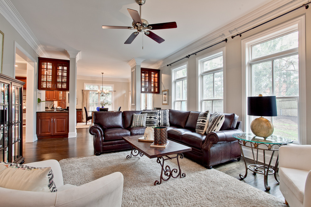 Family room - large transitional open concept family room idea in Chicago
