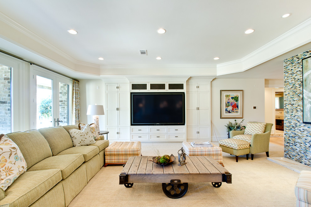 Family room - large transitional carpeted family room idea in Atlanta with beige walls and a media wall