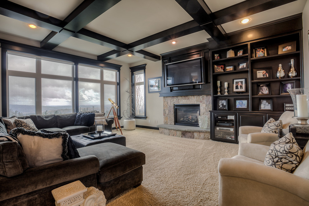 Inspiration for a large traditional mezzanine games room in Seattle with a music area, beige walls, carpet, a standard fireplace, a stone fireplace surround and a wall mounted tv.