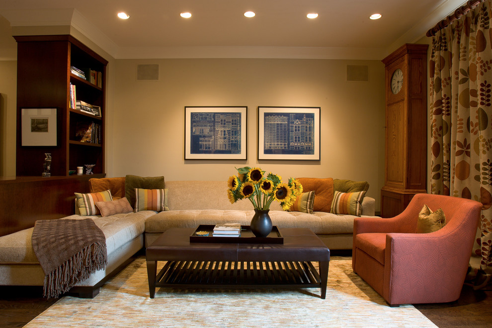 Idée de décoration pour une salle de séjour design avec un mur beige.