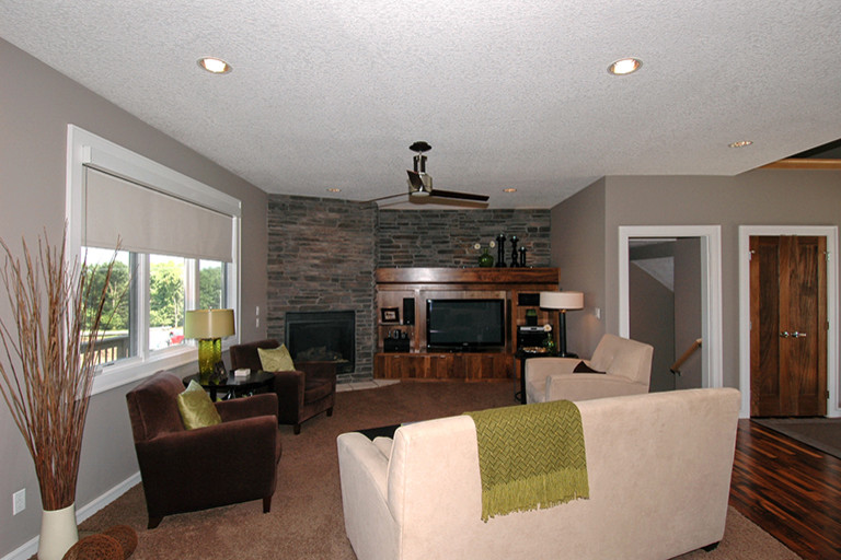 Example of a minimalist family room design in Cedar Rapids