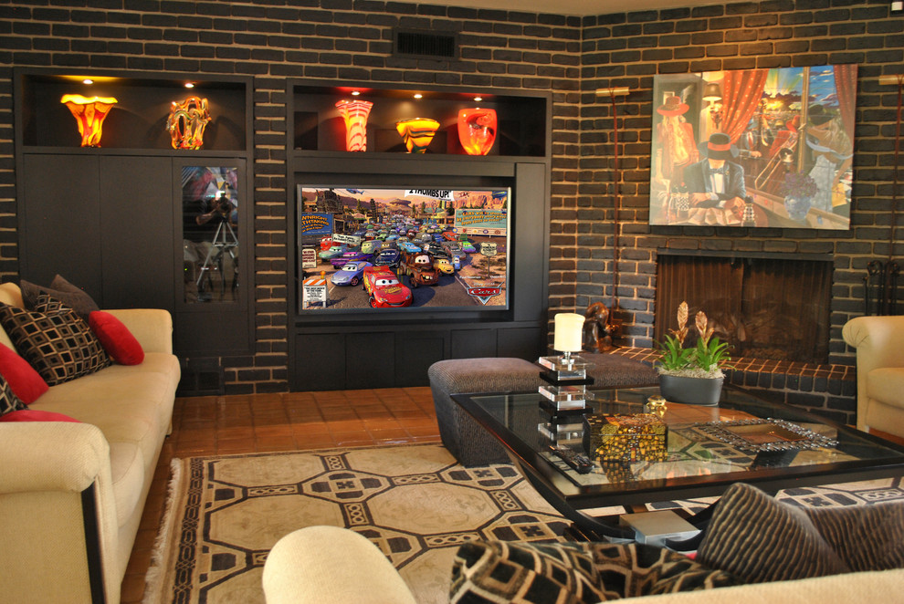 Family room - large contemporary open concept terra-cotta tile family room idea in Phoenix with gray walls, a corner fireplace, a brick fireplace and a media wall