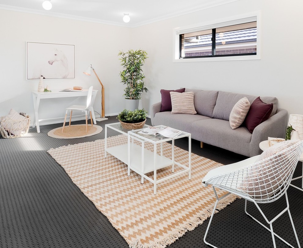 Esempio di un soggiorno design di medie dimensioni con pareti grigie, moquette e pavimento grigio