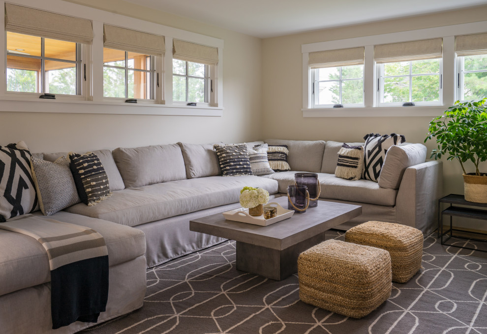 Example of a transitional family room design in Boston with beige walls