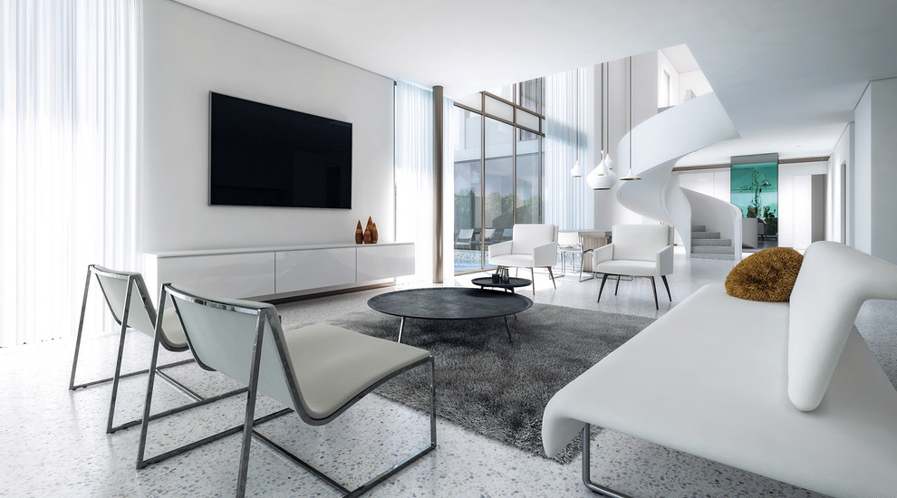 Стильный дизайн: большая гостиная комната в стиле модернизм с белыми стенами, бетонным полом, телевизором на стене, белым полом и ковром на полу без камина - последний тренд