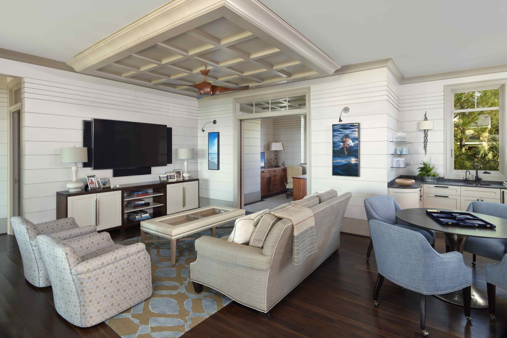 Inspiration for a coastal open concept dark wood floor, coffered ceiling and shiplap wall family room remodel in Charleston with white walls, no fireplace and a wall-mounted tv