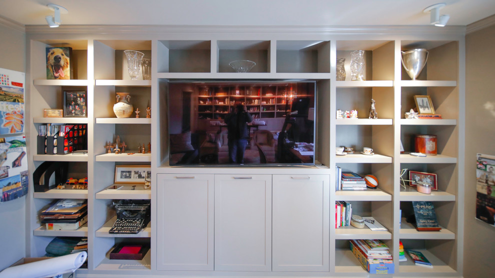 Ispirazione per un piccolo soggiorno minimalista con pareti beige e TV autoportante