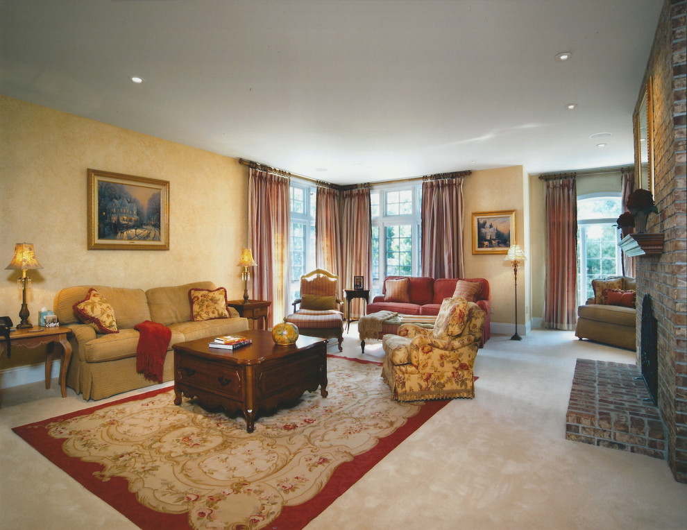 Example of a mid-sized classic enclosed carpeted family room design in New York with beige walls, a standard fireplace and a brick fireplace