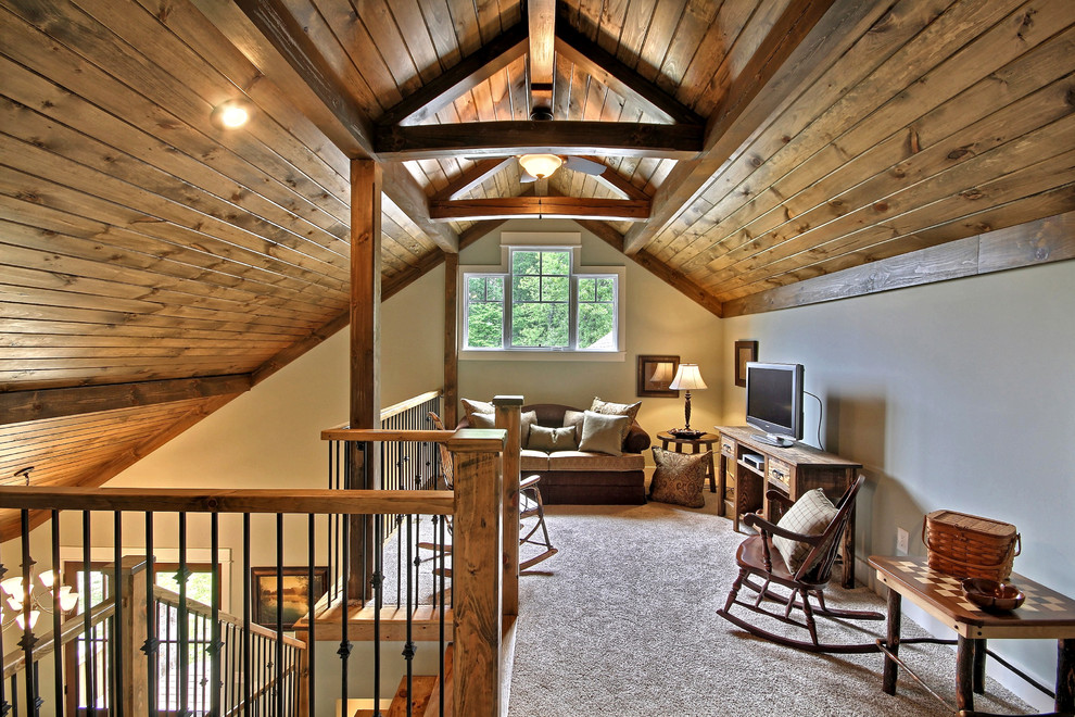 Photo of a small traditional mezzanine games room in Atlanta with carpet, white walls, no fireplace, a freestanding tv, beige floors and feature lighting.