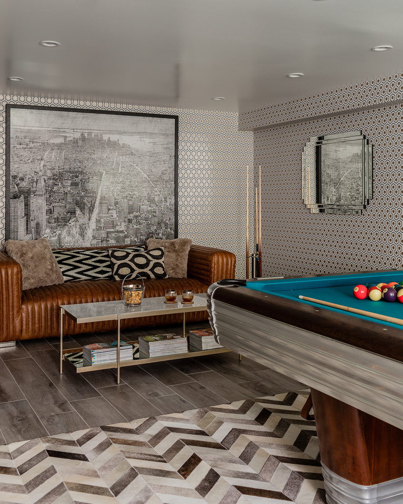 Small minimalist open concept ceramic tile and gray floor game room photo in New York with gray walls, no fireplace and a wall-mounted tv