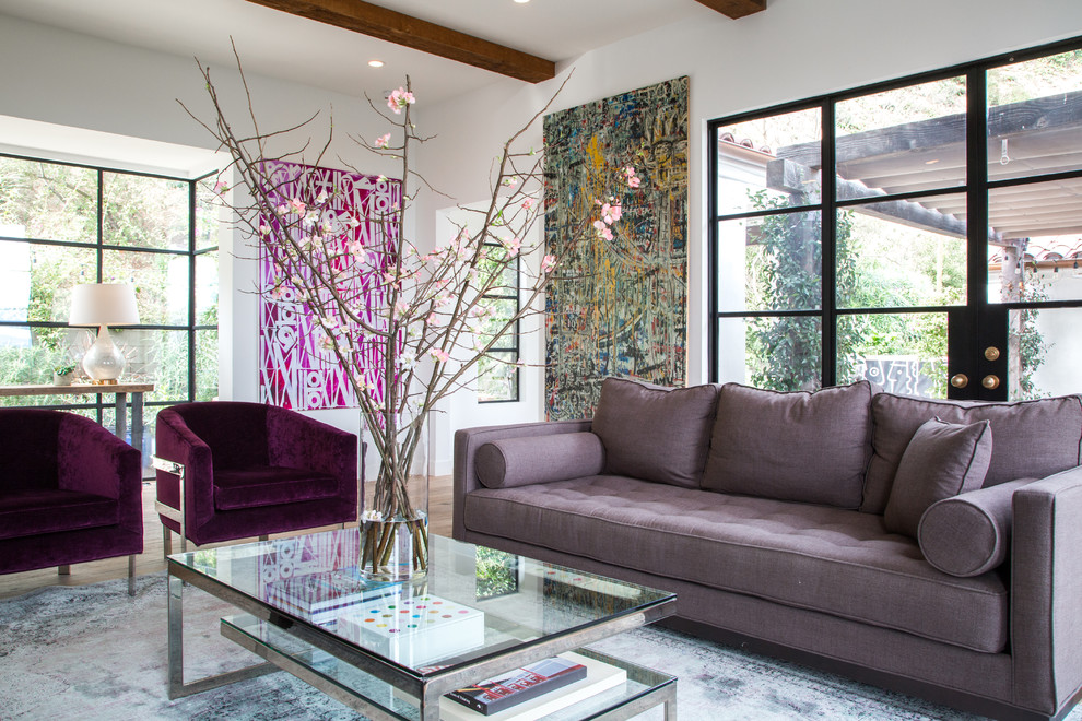 Tuscan family room photo in Los Angeles