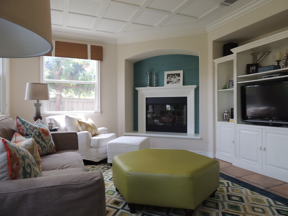 Inspiration for a mid-sized transitional open concept porcelain tile family room remodel in San Diego with white walls, a corner fireplace, a wood fireplace surround and a media wall