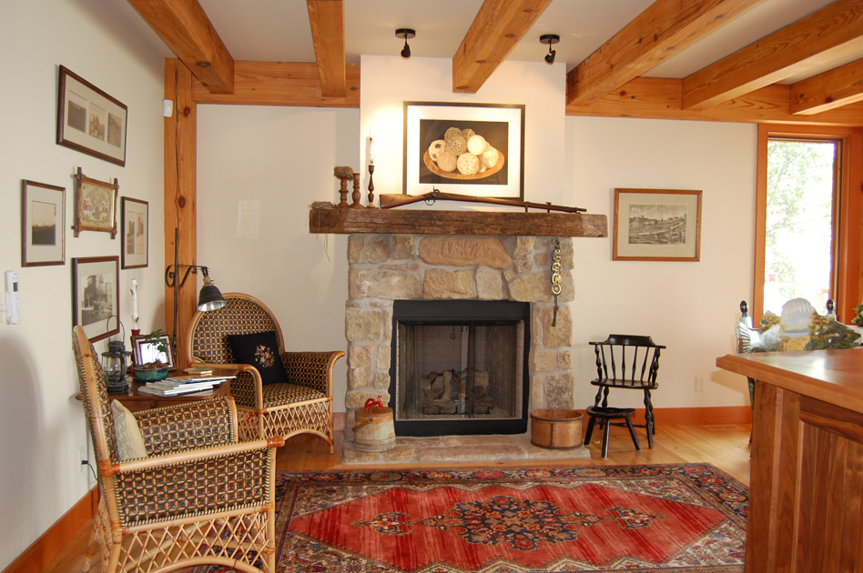 Family room - coastal medium tone wood floor family room idea in New York
