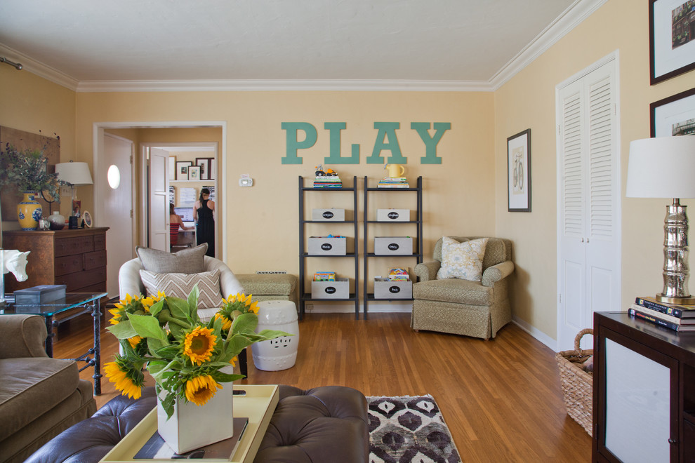 Photo of a medium sized classic games room in Other with a reading nook, yellow walls and medium hardwood flooring.