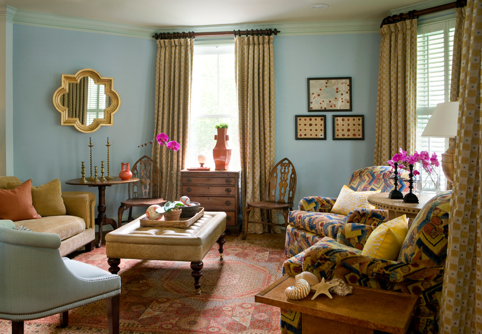 Inspiration for a large eclectic open concept medium tone wood floor family room remodel in Boston with blue walls
