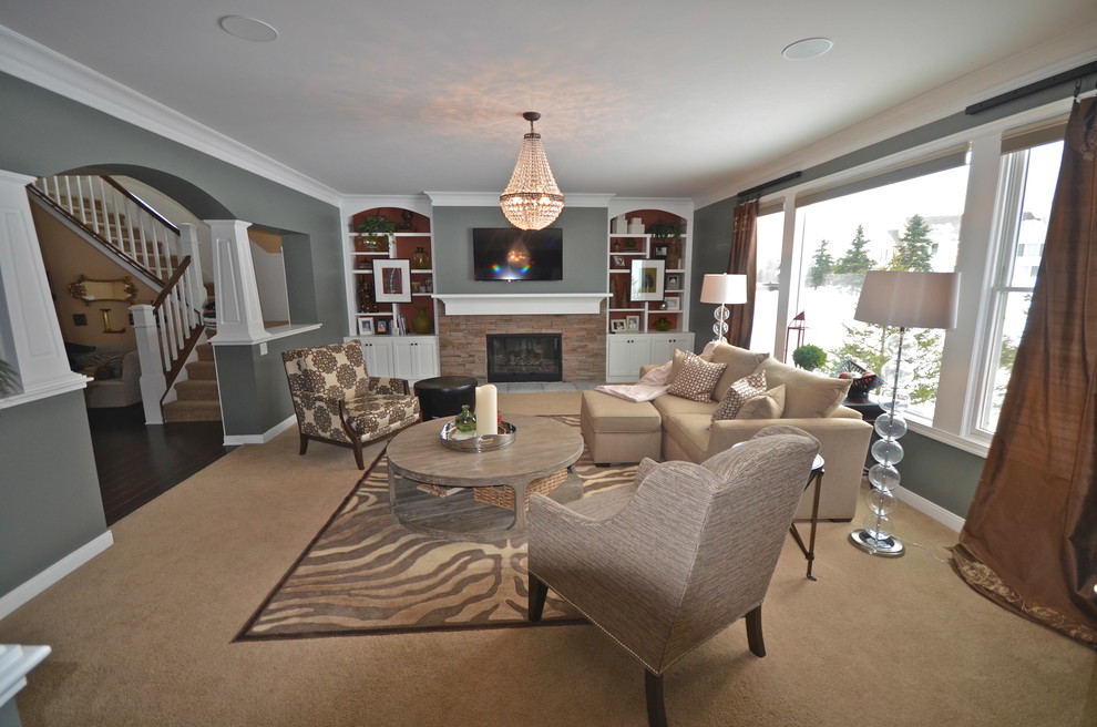 Example of a transitional family room design in Grand Rapids