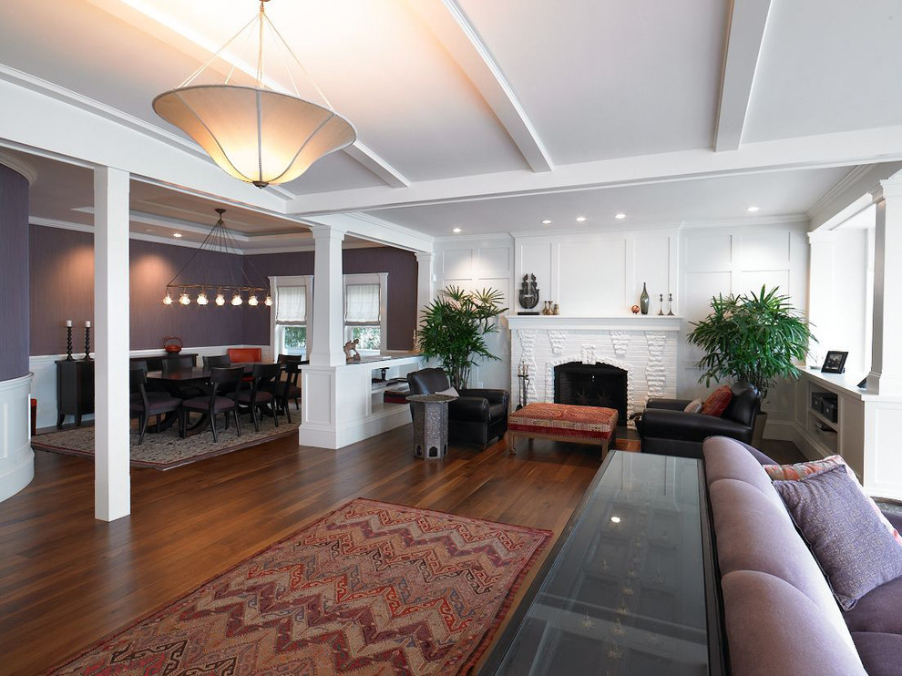 Inspiration for a large victorian open concept dark wood floor and brown floor family room remodel in Boston with white walls, a standard fireplace, a brick fireplace and a corner tv