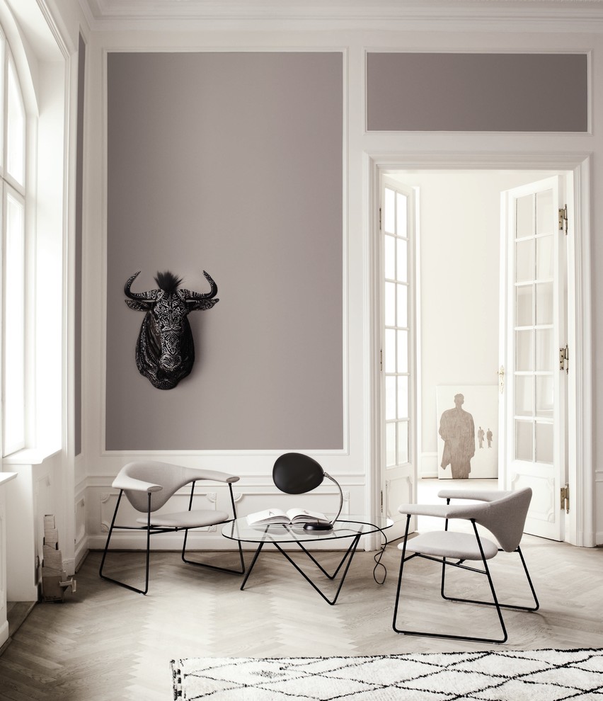 Example of a trendy family room design in New York with gray walls