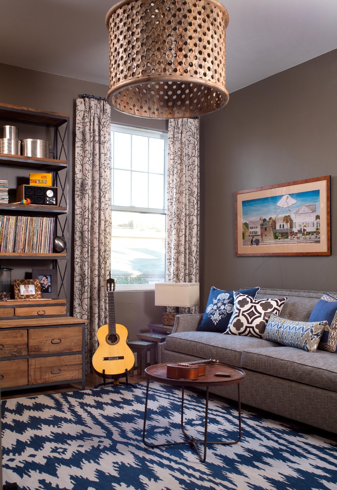 Inspiration for a bohemian games room in Denver with grey walls.