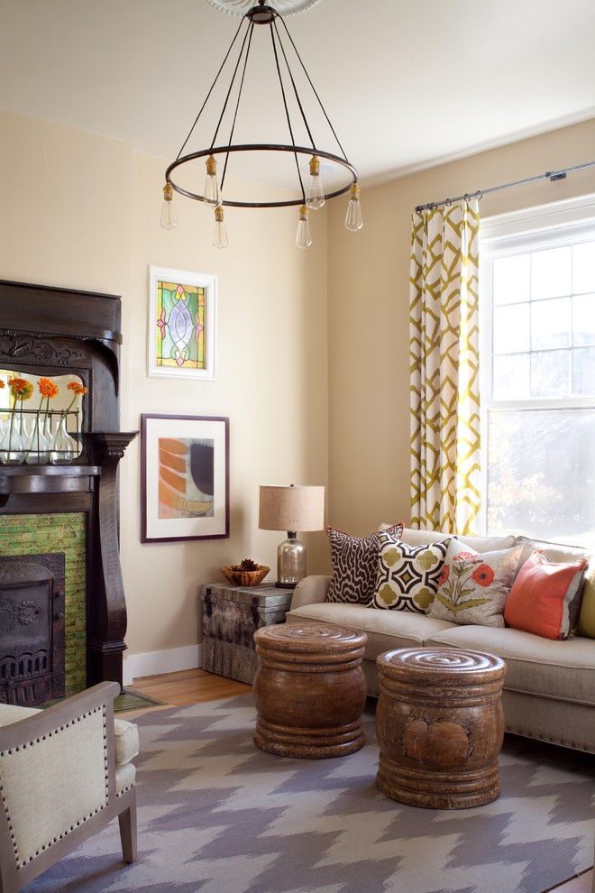 Family room - eclectic family room idea in Denver with beige walls