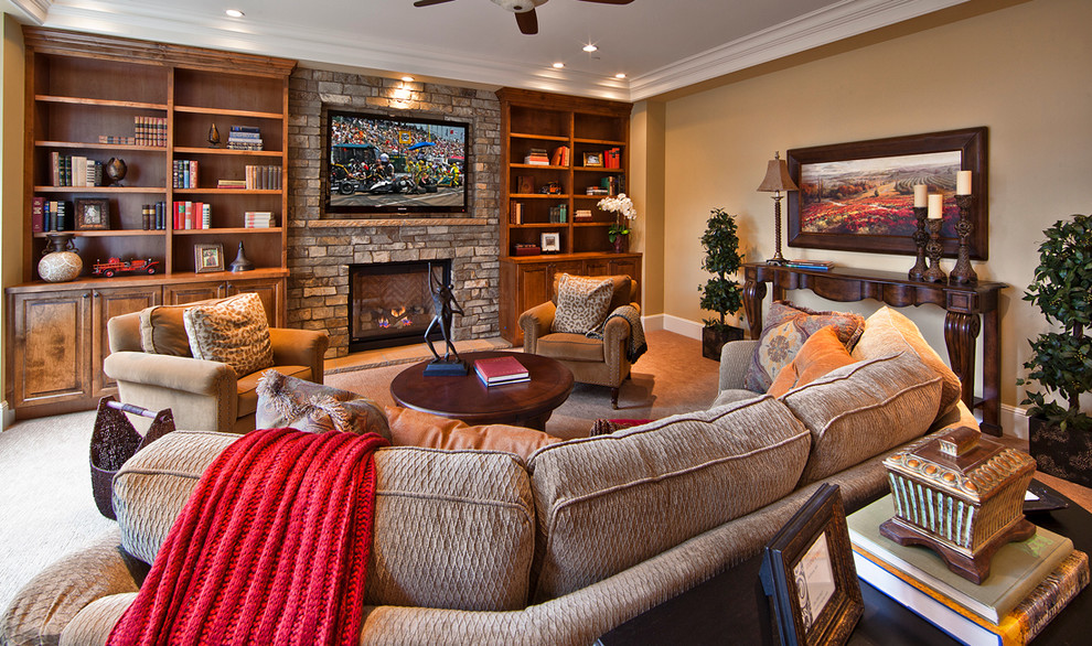 Large elegant enclosed carpeted family room photo in Seattle with beige walls, a standard fireplace, a stone fireplace and a wall-mounted tv