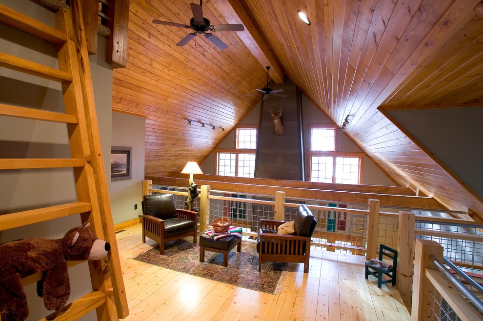 Loft Rustic Family Room Minneapolis by Lands End Development
