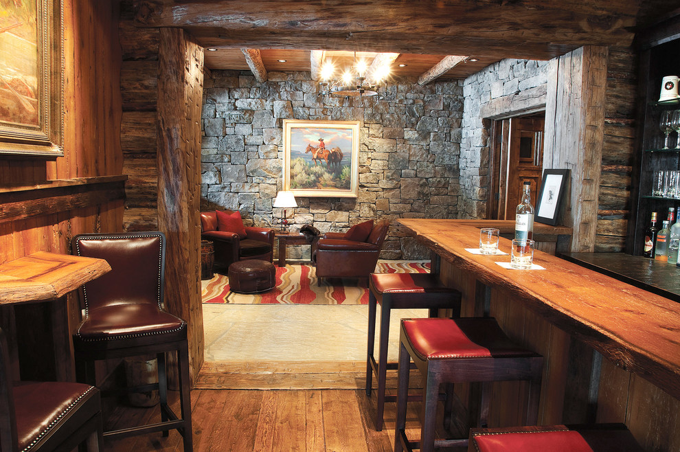 Idées déco pour une salle de séjour montagne avec un bar de salon et un sol en bois brun.