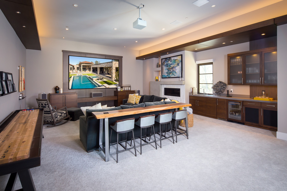 Game room - mid-sized contemporary open concept carpeted and gray floor game room idea in Sacramento with beige walls, a ribbon fireplace, a tile fireplace and a media wall