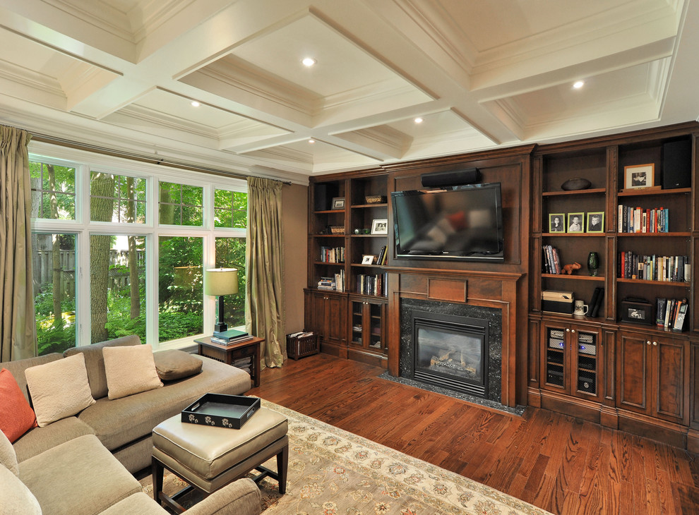 Family room - contemporary enclosed dark wood floor family room idea in Toronto with beige walls, a standard fireplace and a wall-mounted tv