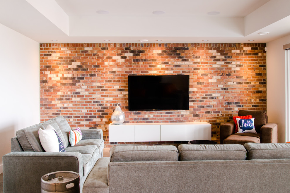 Источник вдохновения для домашнего уюта: большая открытая гостиная комната в стиле модернизм с белыми стенами, бетонным полом, телевизором на стене и серым полом без камина