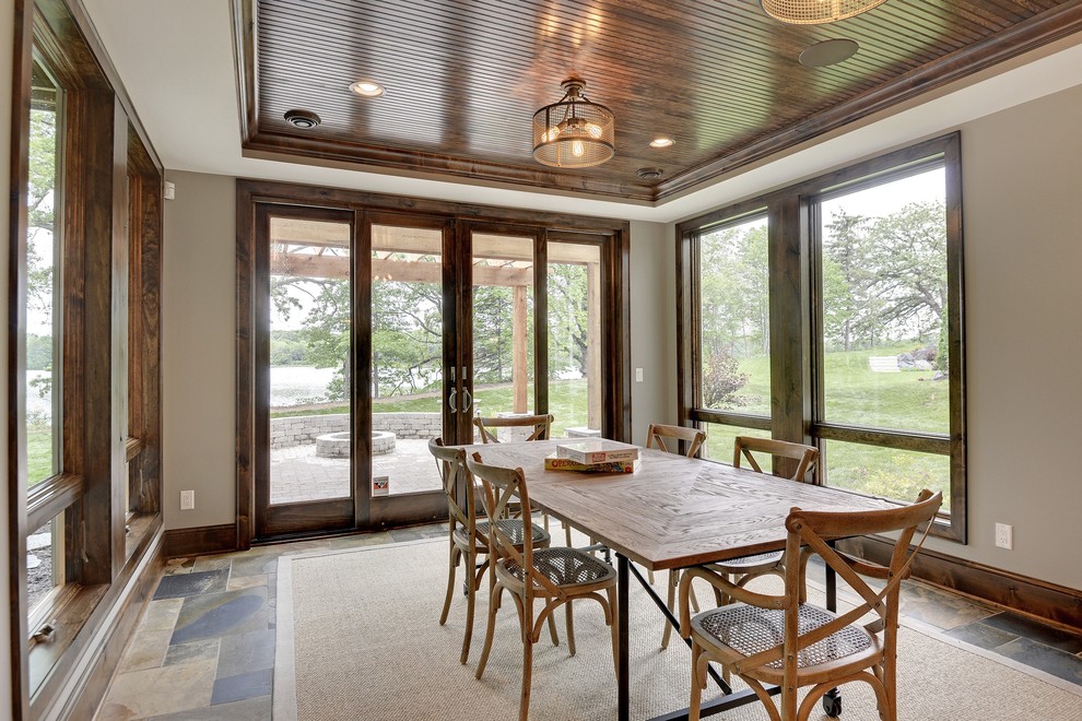 Game room - large transitional enclosed game room idea in Minneapolis with beige walls and no fireplace