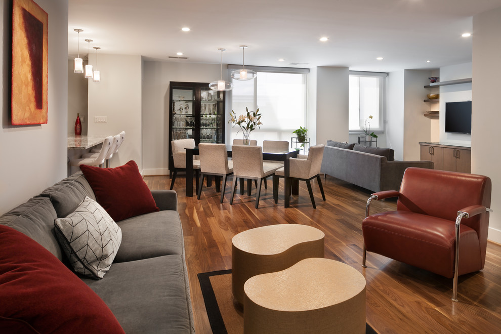 Inspiration for a small contemporary open concept medium tone wood floor family room remodel in DC Metro with gray walls, no fireplace and a wall-mounted tv