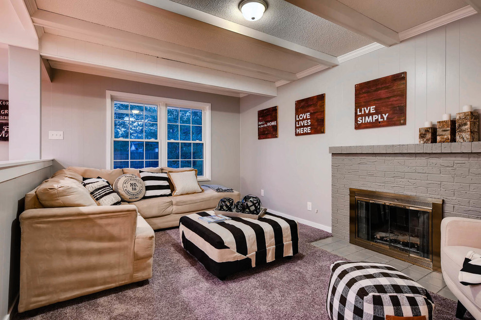 Photo of a medium sized classic enclosed games room in Denver with a standard fireplace, grey walls, carpet, a brick fireplace surround, no tv and purple floors.