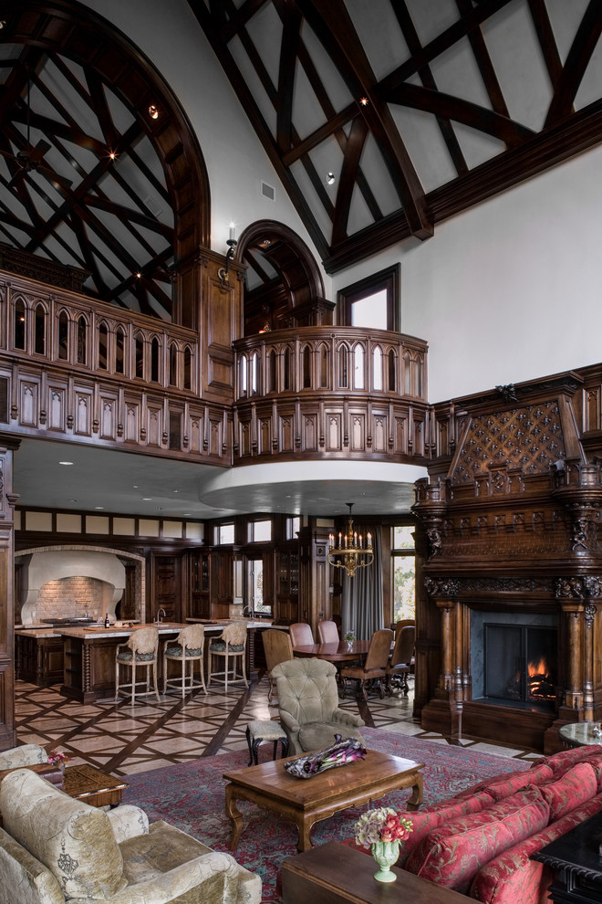 Пример оригинального дизайна: гостиная комната в классическом стиле с фасадом камина из дерева