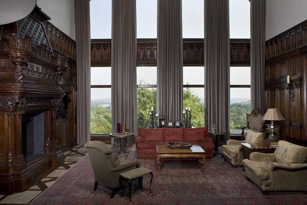 Family room - traditional family room idea in Austin with a wood fireplace surround