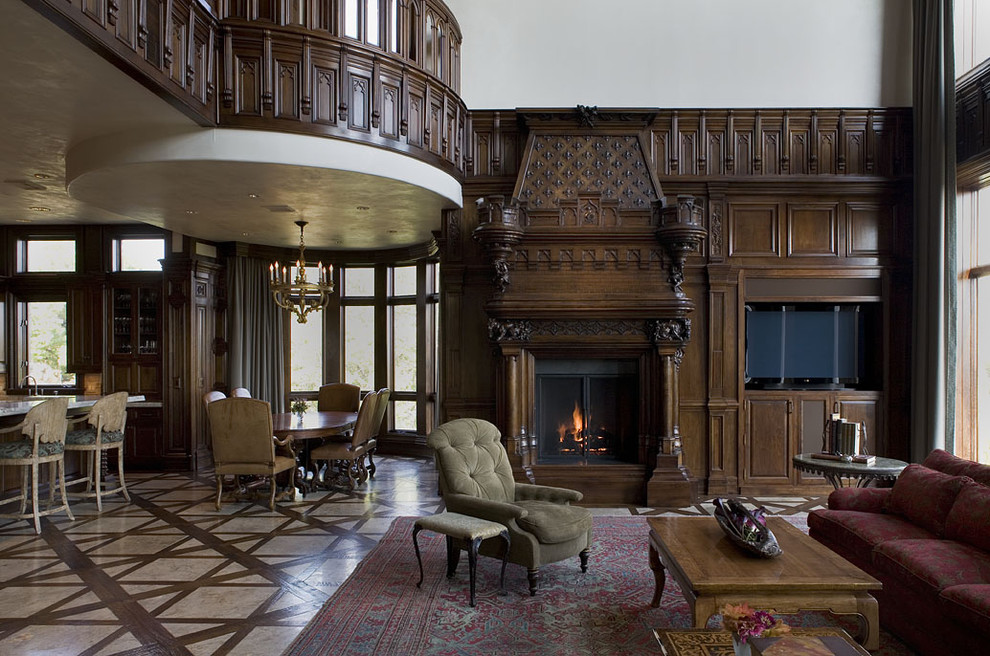 На фото: гостиная комната в классическом стиле с фасадом камина из дерева