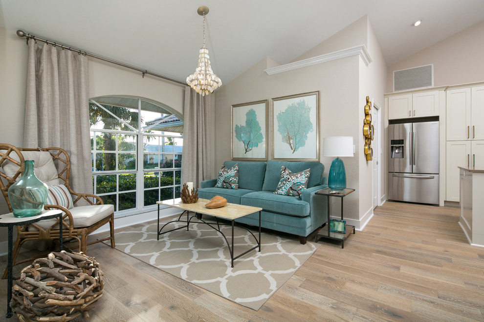 Example of a beach style family room design in Tampa