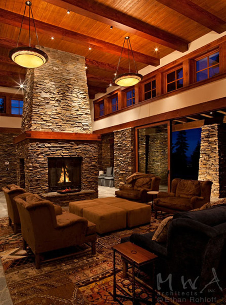 Example of a large arts and crafts open concept family room design in Sacramento with beige walls, a standard fireplace and a stone fireplace