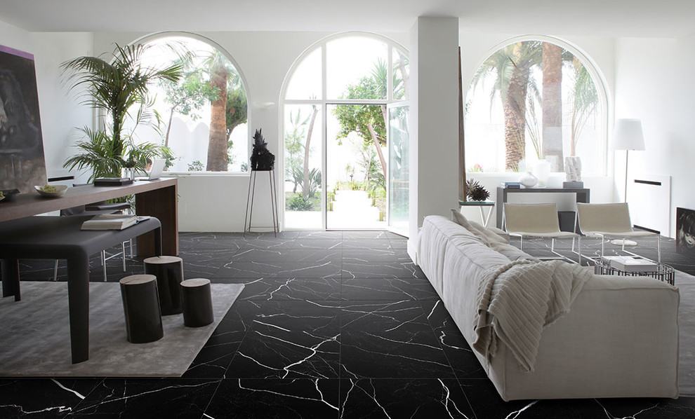 Inspiration pour une salle de séjour design avec un sol en carrelage de porcelaine.