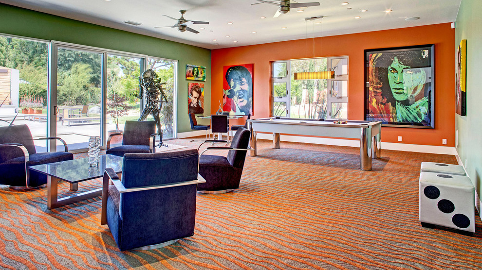 Medium sized contemporary open plan games room in Orange County with a game room, orange walls, carpet, no tv and multi-coloured floors.