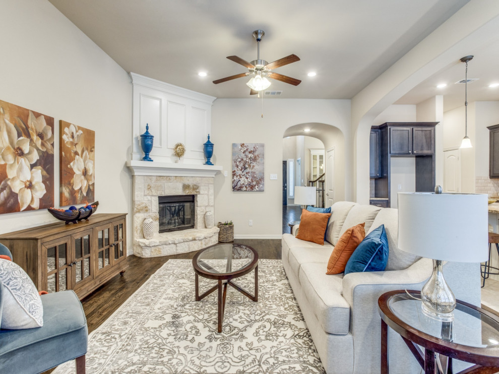 Inspiration for a medium sized classic open plan games room in Dallas with a game room, carpet, a corner fireplace, a stone fireplace surround and a built-in media unit.