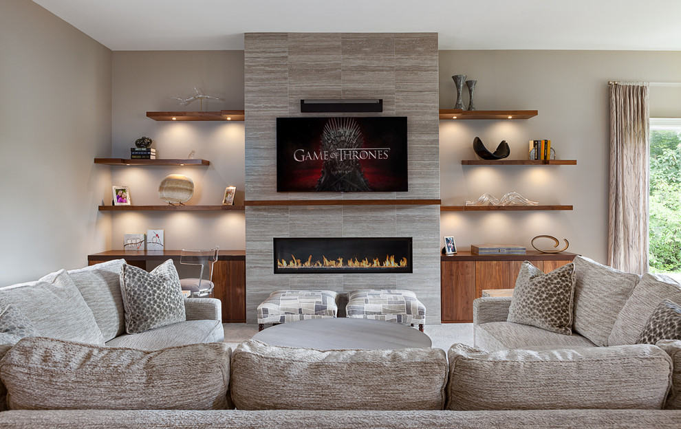 Photo of a medium sized classic open plan games room in DC Metro with grey walls, a ribbon fireplace, a tiled fireplace surround and a wall mounted tv.