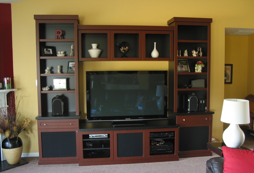 Medium sized modern games room in Indianapolis with a built-in media unit.