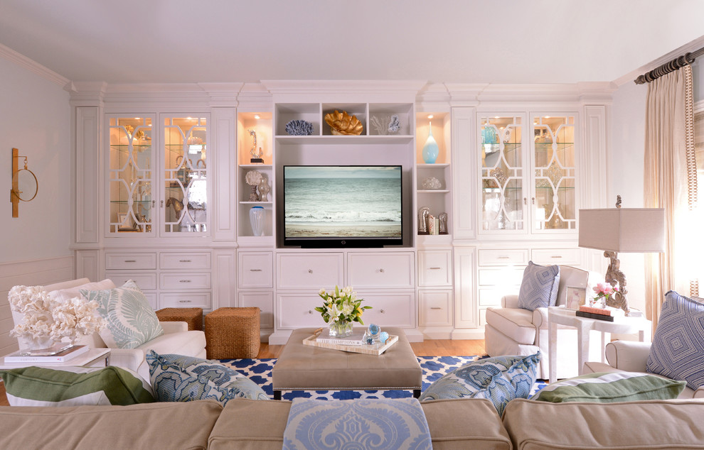 Inspiration for a timeless family room remodel in Dallas with a media wall