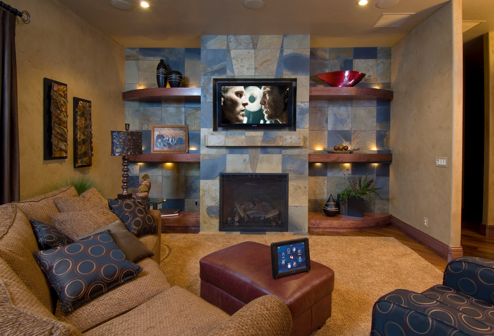 Family room - traditional family room idea in Denver with a tile fireplace
