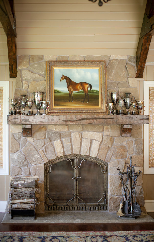 Inspiration for a timeless family room remodel in Minneapolis with a stone fireplace