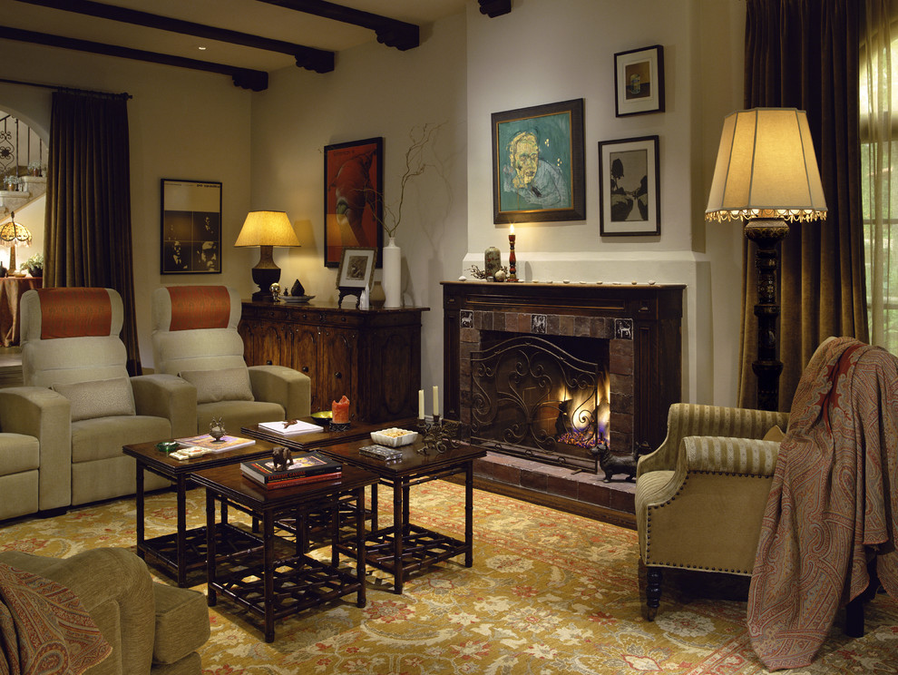 This is an example of a rustic living room in Los Angeles with a tiled fireplace surround.